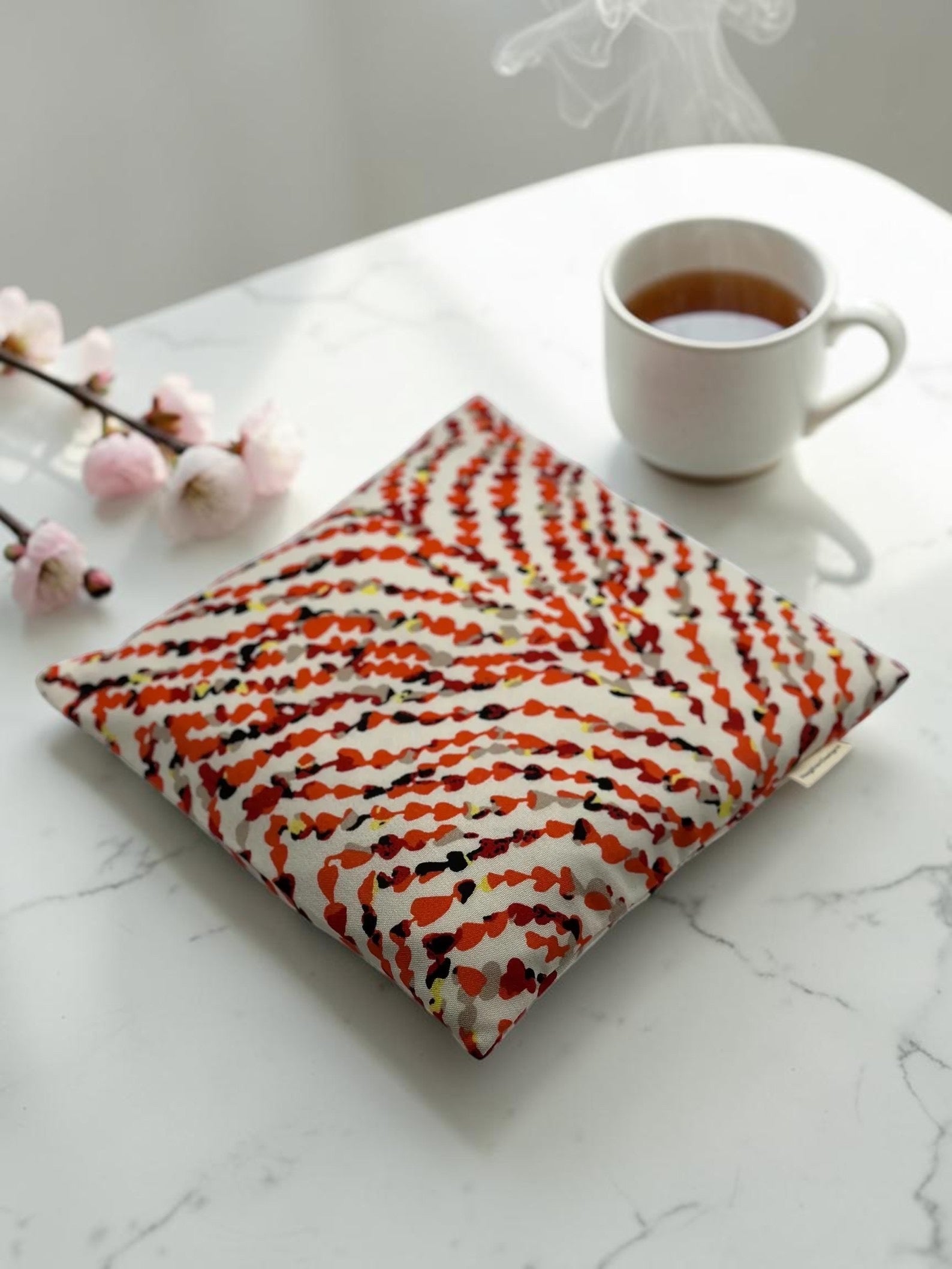 Cream orange abstract brushstroke print 9x9 heating and cooling pad