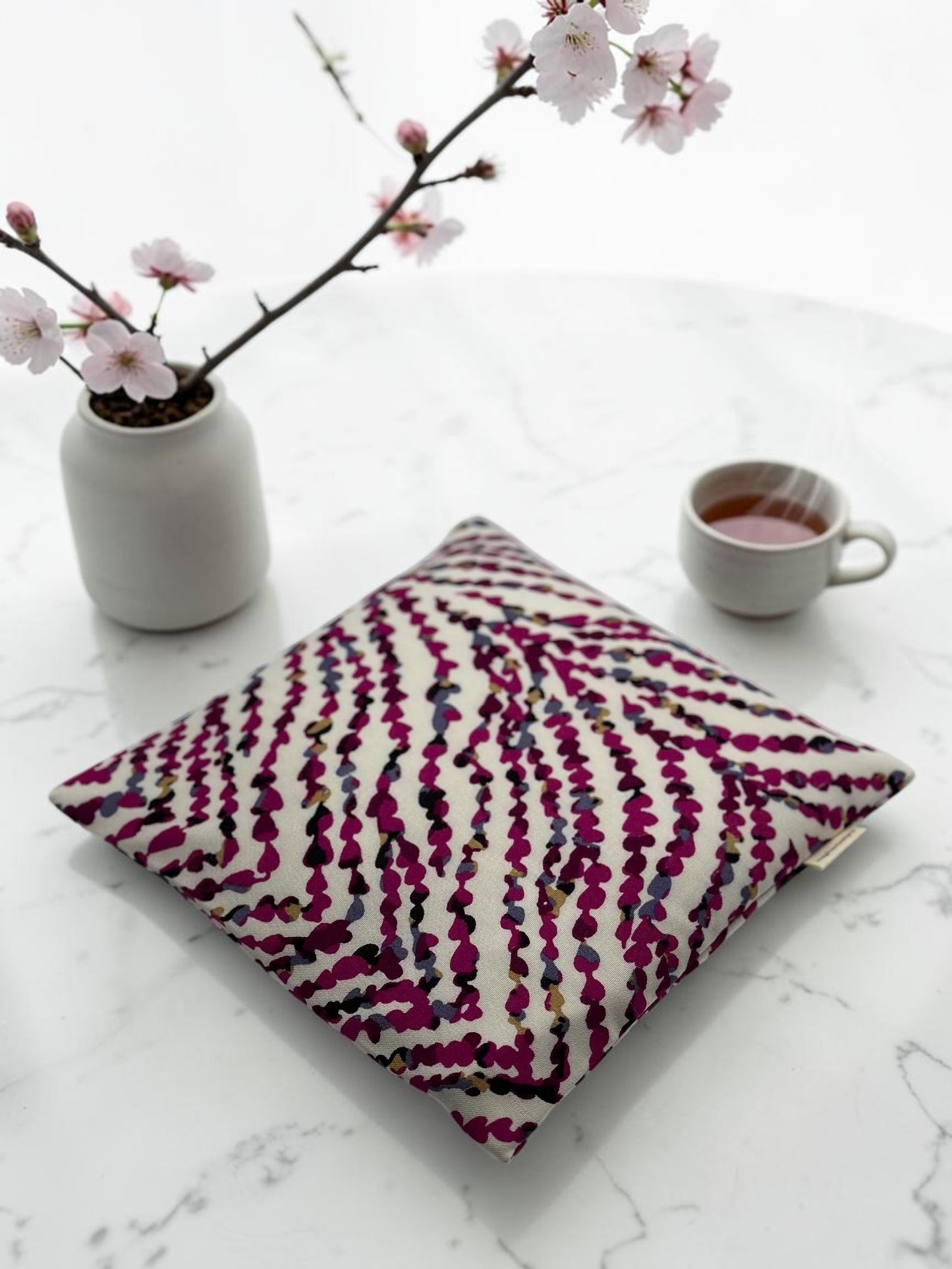 Cream magenta abstract brushstroke print 9x9 heating and cooling pad