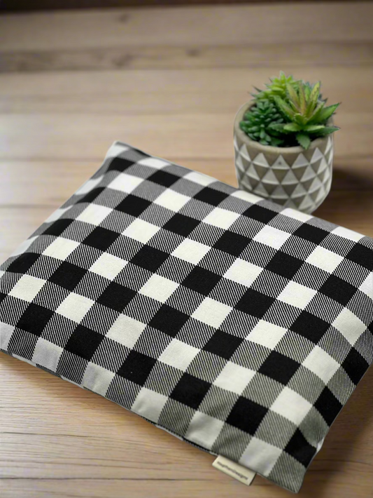Black and white checker fabric heating and cooling pad